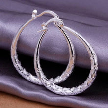 Load image into Gallery viewer, ARETES EN FORMA DE GOTA DE PLATA ESTERLINA 925
